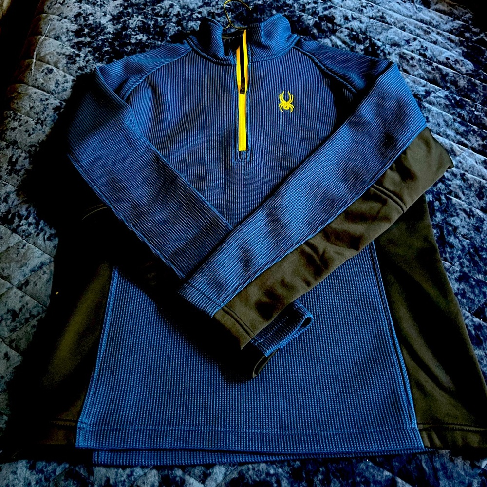 Spyder blue and black fleece lined half zip. Yellow zipper and embroidered logos